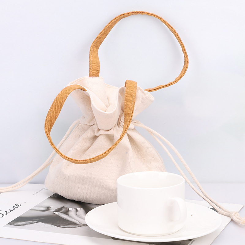 Solid Color Artistic Canvas Tote Bag with Simple Drawstring Design Mini Mobile Phone Key Storage Fashionable Letter Pattern